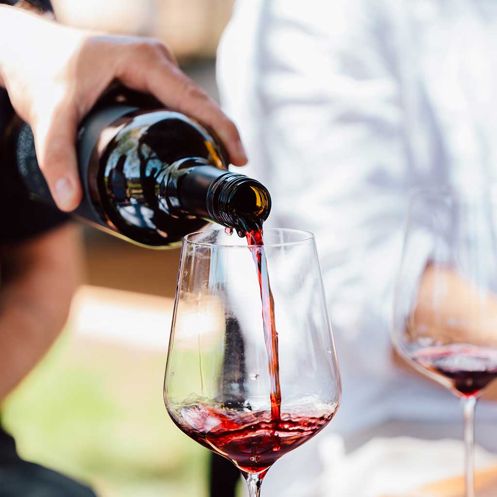 Wine being poured on a Margaret River wine tour.