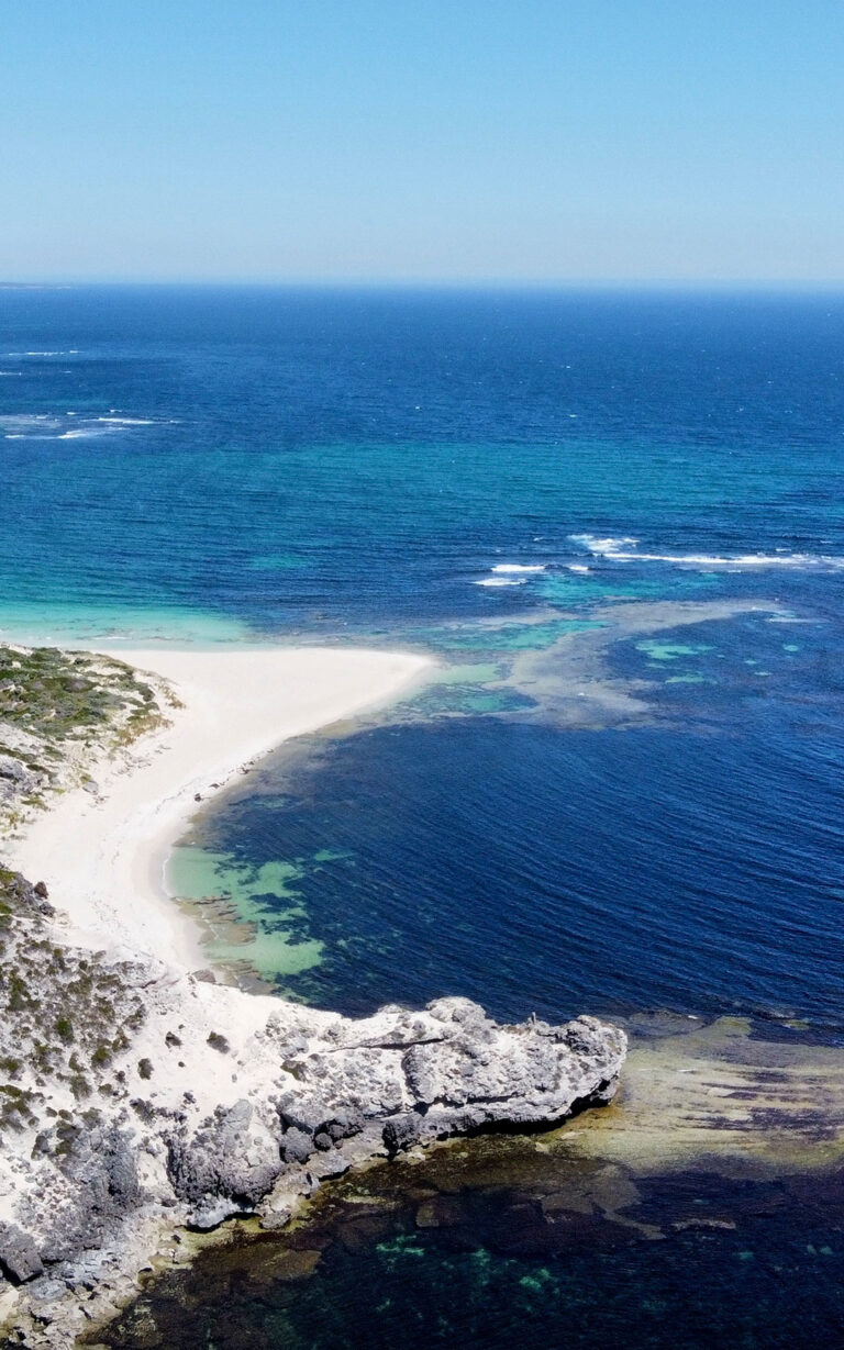 A limestone coastline with shallow bays.